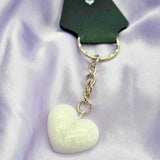 Breastmilk inclusion ecopoxy heart keychain with a choice of glitter or metallic leaf