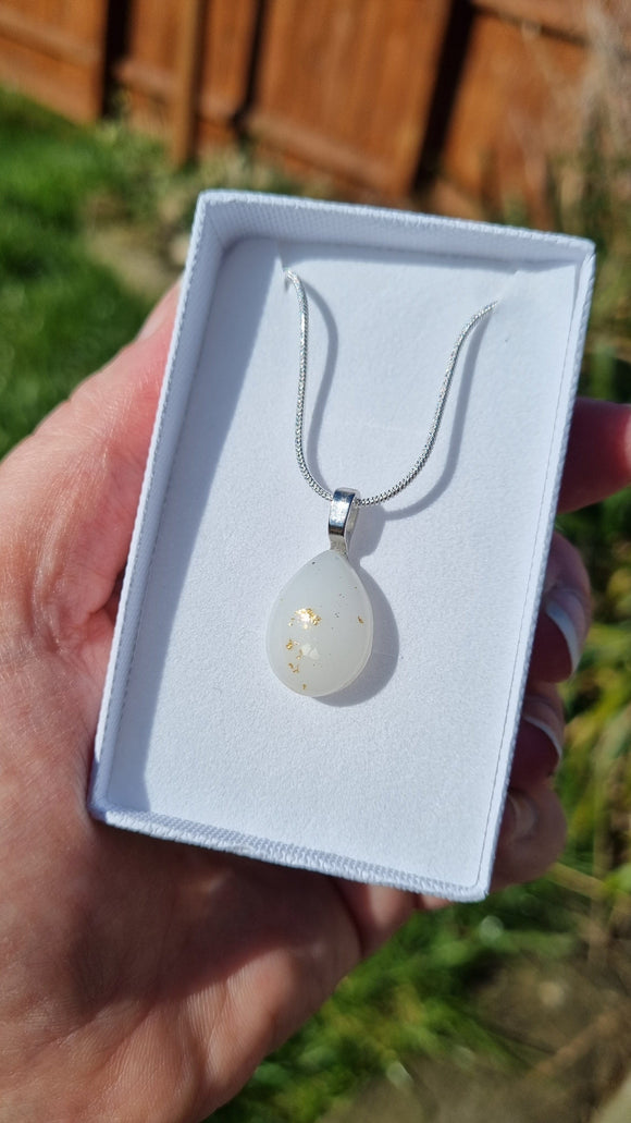 Breastmilk jewelry ecopoxy teardrop pendant with a silver chain in a choice of colours