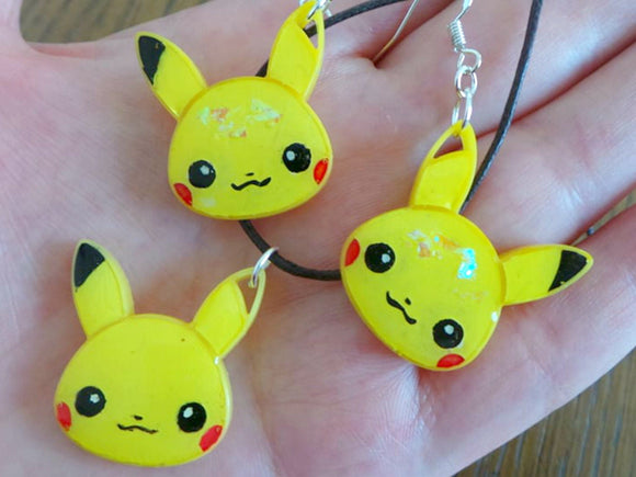 Selection of hand painted pokemon charms as either keychains, pin badges or jewellery sets