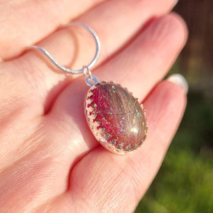 Eco resin ash or fur pendant, circle or oval shaped bezel available. On Sterling silver chain.