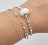 Silver Breastmilk bead charm bracelet in a choice of styles.