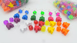 Dice and meeple earrings in a variety of bright colours, geeky nerd jewelry