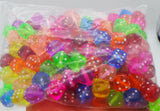 Dice and meeple earrings in a variety of bright colours, geeky nerd jewelry