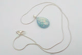 Breastmilk jewelry ecopoxy teardrop pendant with a silver chain in a choice of colours