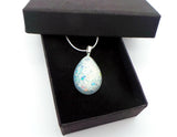 Breastmilk jewelry ecopoxy teardrop pendant with a silver chain in a choice of colours