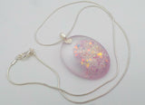 Large oval breastmilk pendant with a choice of opal glitters, on a Sterling  silver chain