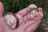 Lock of hair keepsake, baby's first curl, ecopoxy resin palm stone heart with a choice of opal glitters