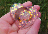 Lock of hair keepsake, baby's first curl, ecopoxy resin palm stone heart with a choice of opal glitters