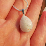 Breastmilk jewelry ecopoxy teardrop pendant with a silver chain in a choice of colours