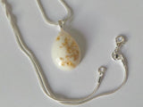 Breastmilk teardrop pendant with gold copper or silver leaf