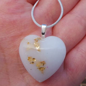 Breastmilk inclusion ecopoxy heart pendant with gold copper or silver leaf on a Sterling silver snake chain, breastmilk jewelry keepsake