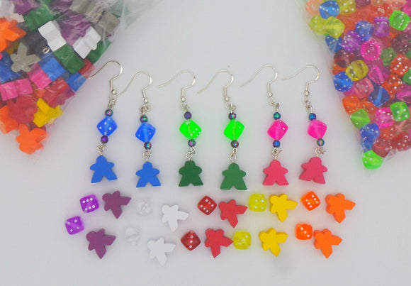 Dice and meeple earrings in a variety of bright colours, geeky nerd jewelry